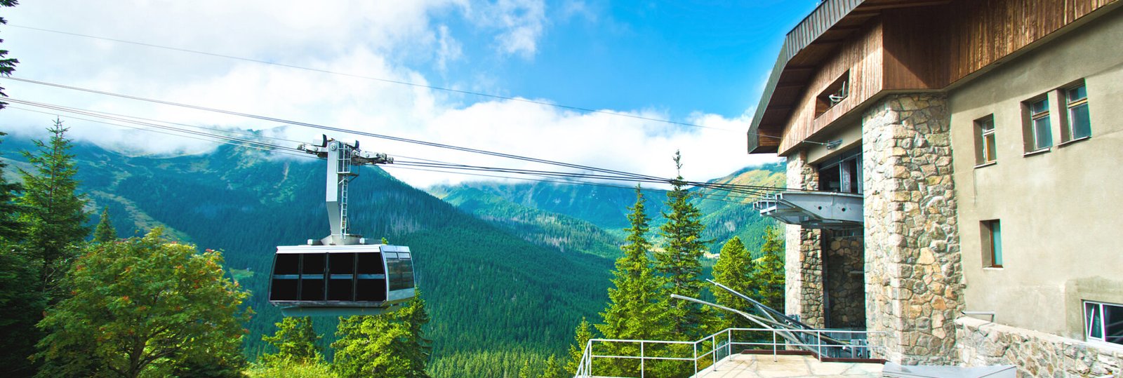 Gondola cable car in mountains. Vacation in mountains.